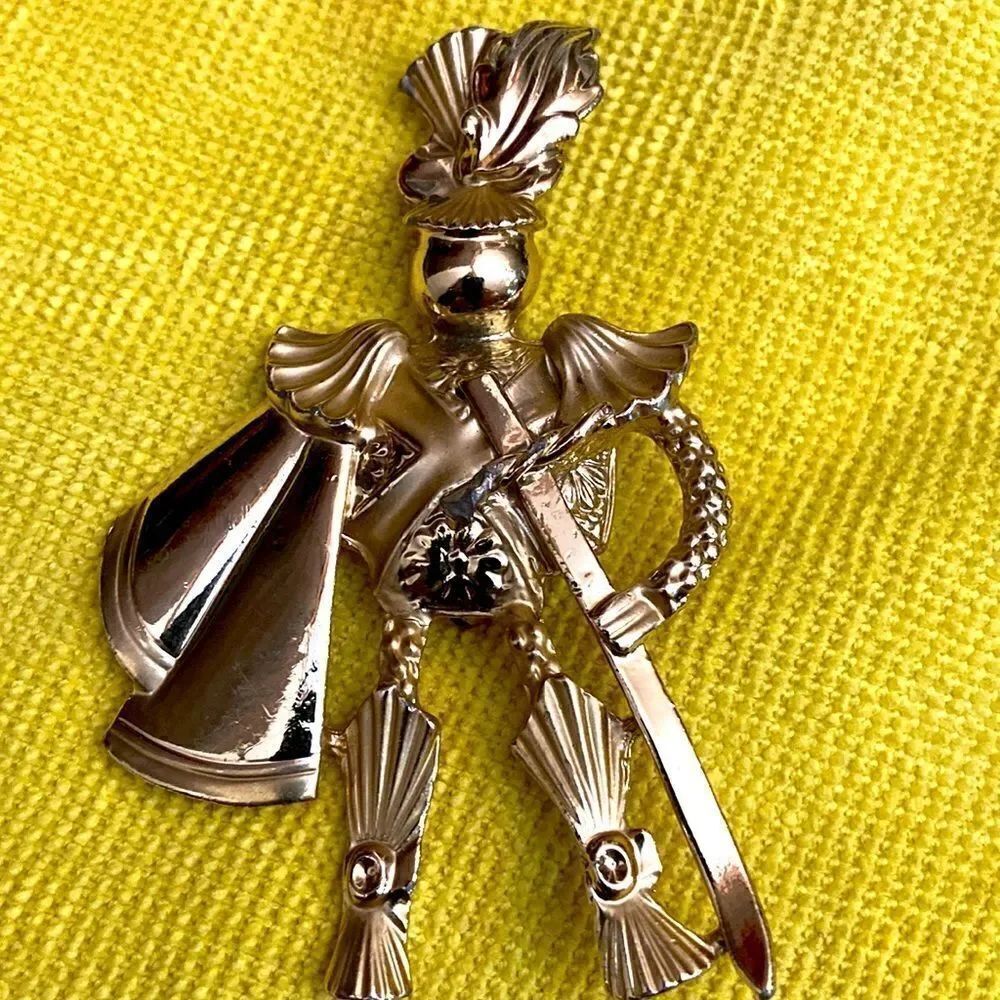 AJC vintage armor brooch